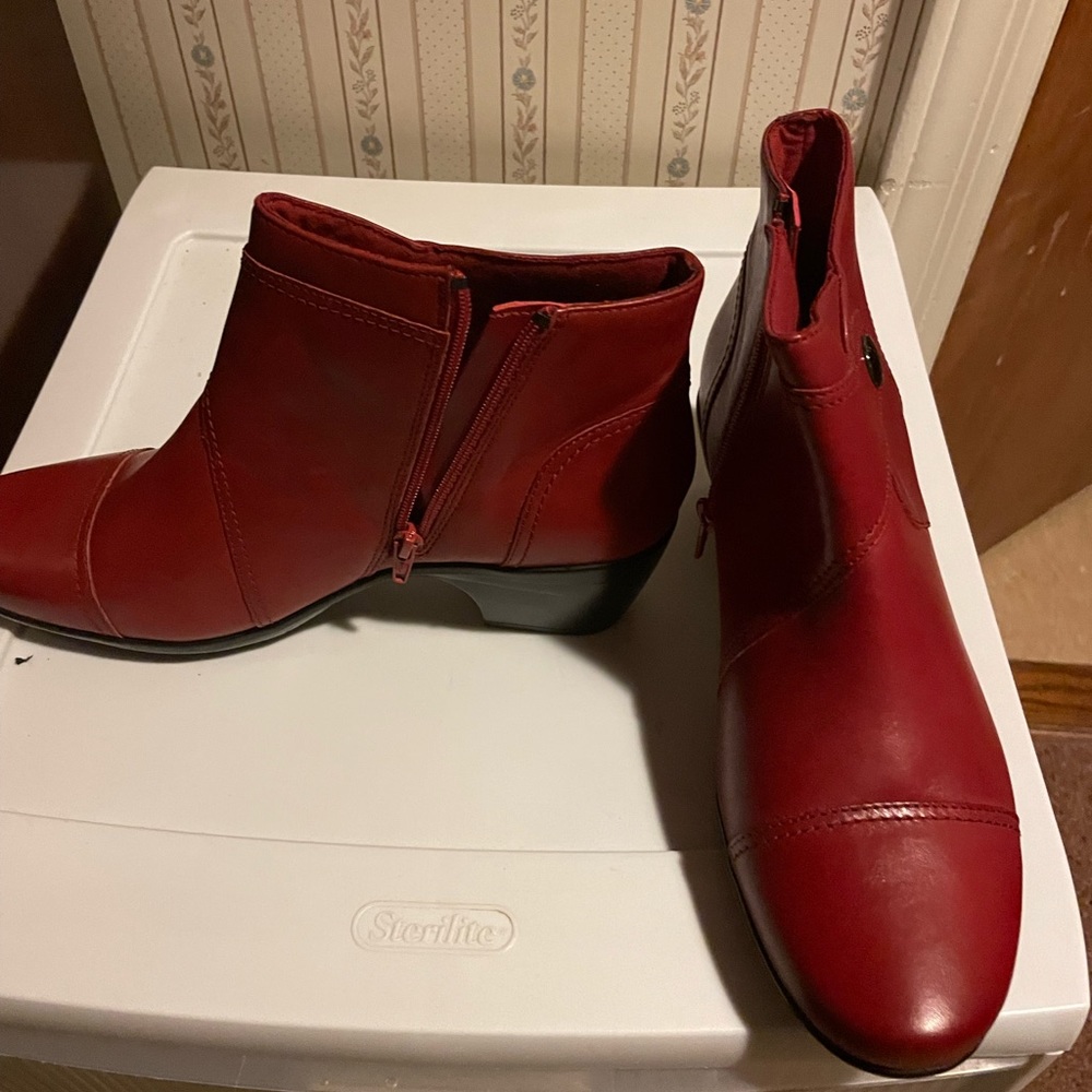 Ladies ankle boots. New never worn, still in box. Red in color